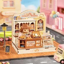 Laden Sie das Bild in den Galerie-Viewer, 3D Puzzle - Cookii Hasens Keksladen Figured'Art